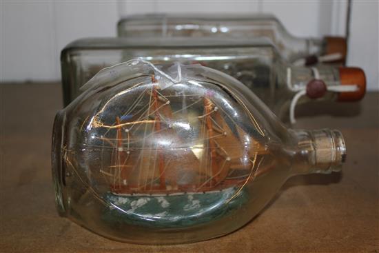 Sailing ship in a Haigs dimple bottle & a pair of German ships in W & A Gilbey gin bottles